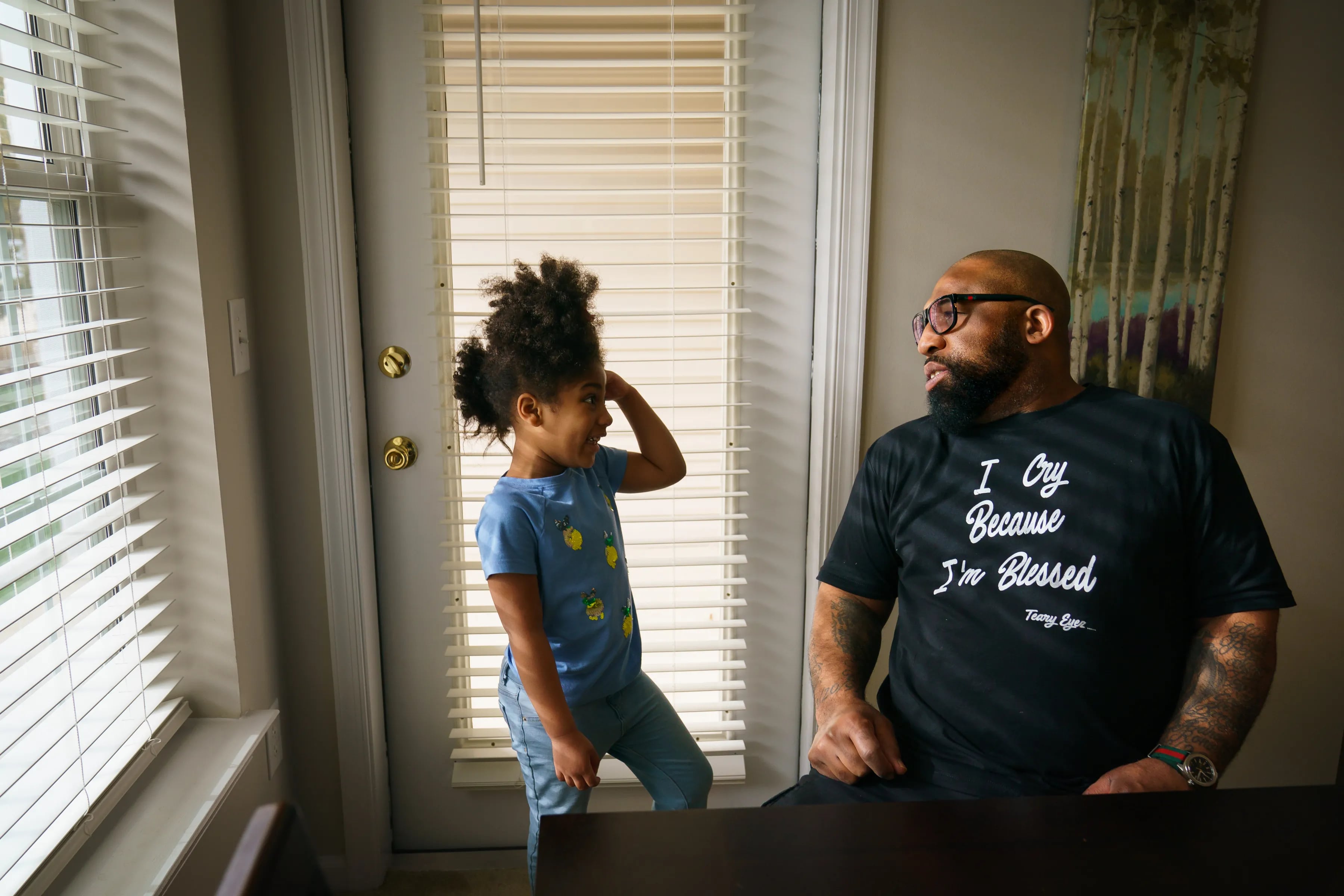THE CASE THAT COLLAPSED Anthony Wright talks with his daughter Halah Ferron, 5, at home in Delaware in April.