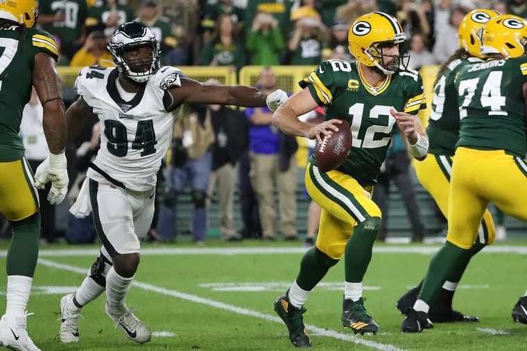 Aaron Rodgers (12) has thrown 20 touchdown passes and two interceptions in his last six games.