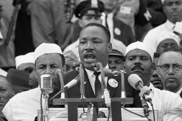 FILE- In this Aug. 28, 1963, black-and-white file photo Dr. Martin Luther King Jr., head of the Southern Christian Leadership Conference, addresses marchers during his &quot;I Have a Dream&quot; speech at the Lincoln Memorial in Washington. NBC News says it will rebroadcast a 1963 &quot;Meet the Press&quot; interview with Martin Luther King Jr. in honor of the March on Washington's 50th anniversary next week. King appeared on the news program three days before his landmark “I Have a Dream” speech at the civil rights march. (AP Photo/File)