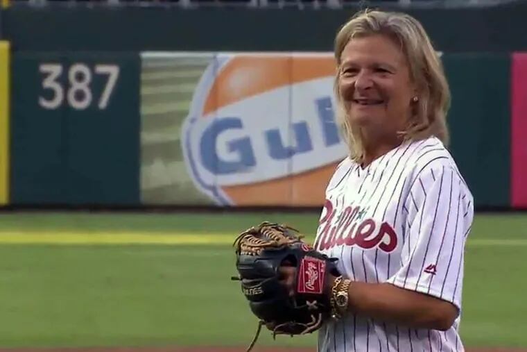 Lisa Scottoline throws out the first pitch at Ladies Night with the Philadelphia Phillies on Aug. 20.