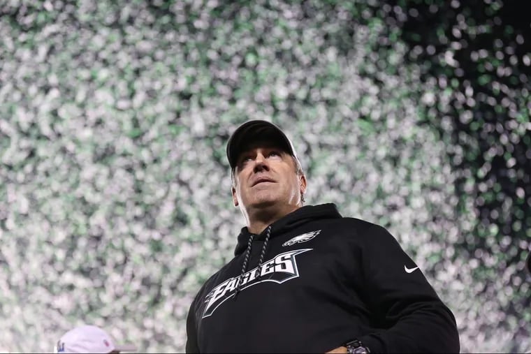 Eaglesâ€™ head coach Doug Pederson looks out over the crowd as confetti falls after the Philadelphia Eagles win 38-7 over the Minnesota Vikings to win the NFC Championship game in Philadelphia, PA on January 21, 2018.