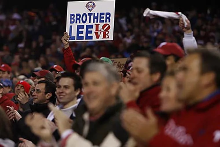 Judging by fan reaction, Cliff Lee could do no wrong on Saturday night. (Ron Cortes/Staff Photographer)