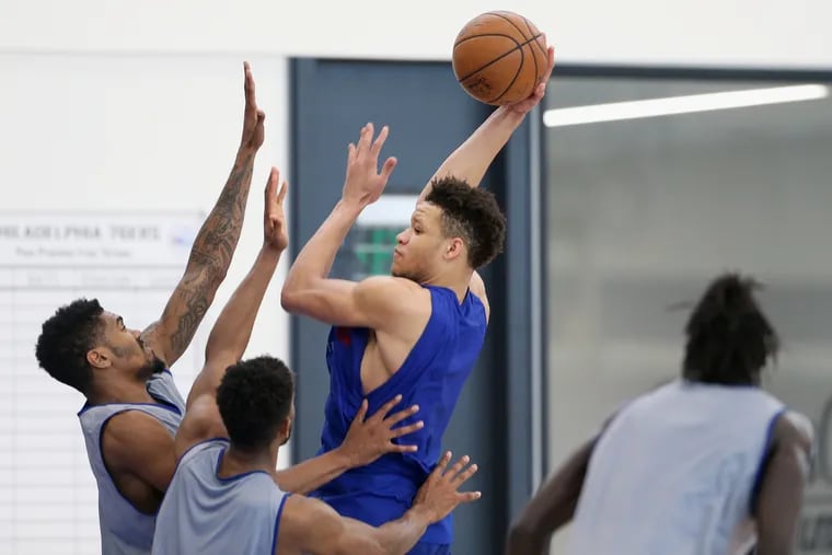 Kentucky forward Kevin Knox, center, shoots during a pre-draft workout at the Sixers' training complex in Camden.