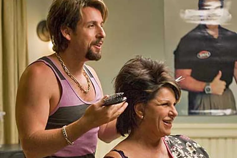 One-time counter-terrorist turned hairstylist Zohan (Adam Sandler) practices his technique with Gail (Lainie Kazan.)