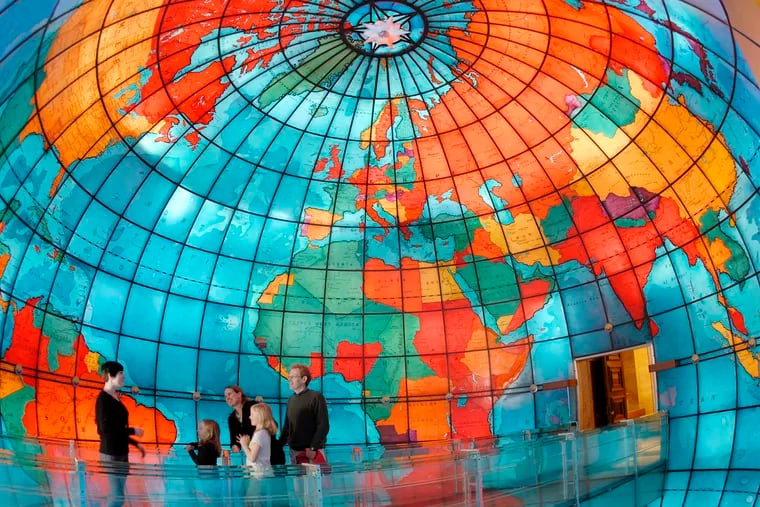 Inside the Mapparium, a three-story, stained glass globe at the Mary Baker Eddy Library in Boston. Tour guides lead visitors through the Mapparium on a glass bridge that's 30 feet long.