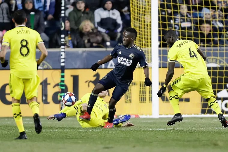 David Accam had two goals and an assist in the Philadelphia Union's 3-0 win over the Columbus Crew at Talen Energy Stadium, just days after his father died.