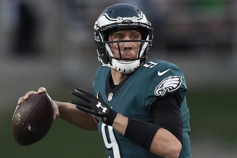 Philadelphia Eagles quarterback Nick Foles looks to pass against the Los Angeles Rams during the second half of an NFL football game Sunday, Dec. 10, 2017, in Los Angeles. (AP Photo/Kelvin Kuo)