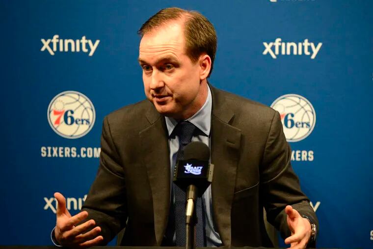 BEN MIKESELL/STAFF PHOTOGRAPHER Sixers general manager Sam Hinkie talked yesterday about the decision to draft Jahlil Okafor on Thursday night and the lingering foot woes of last year's top draft pick, Joel Embiid.