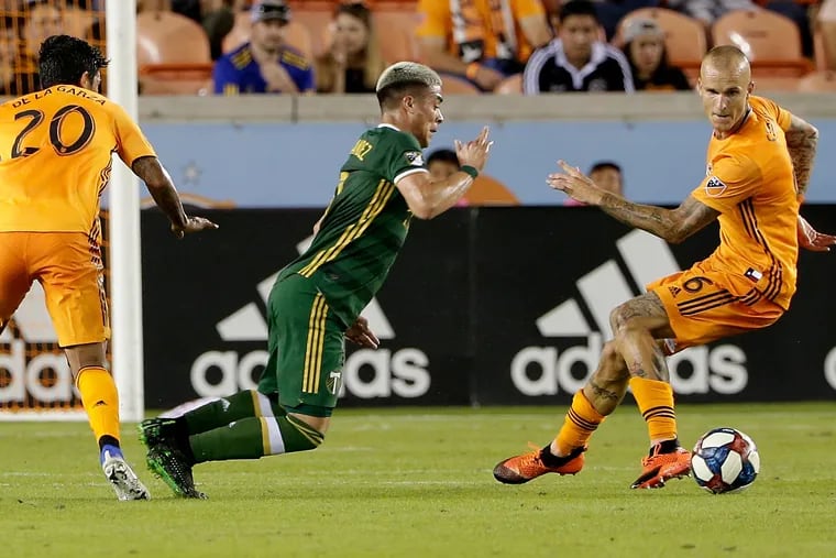 Brian Fernández (middle) scored in his Portland Timbers debut May 15 against the Houston Dynamo.