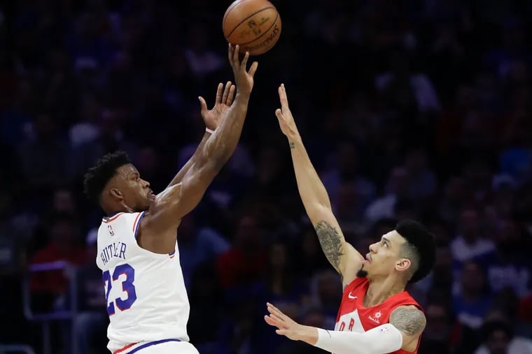 Sixers guard Jimmy Butler shoots the basketball against Toronto Raptors guard Danny Green during game six in the Eastern Conference playoff semifinals on Thursday, May 9, 2019 in Philadelphia.