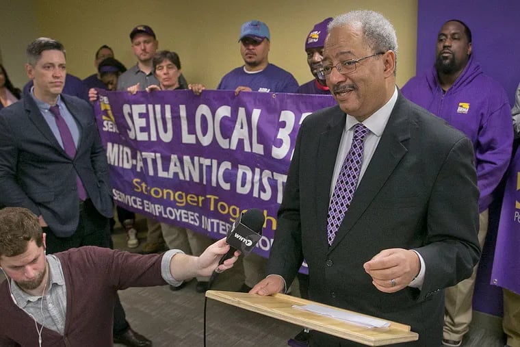U.S Rep Chaka Fattah (right), short of cash and facing federal charges, won backing from the SEIU, which says members will work on his campaign.