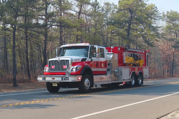 This fire truck drives near the area of a forest fire in Little Egg Harbor on Tuesday, March 7. Another blaze broke out in Little Egg Township on Saturday, April 15.