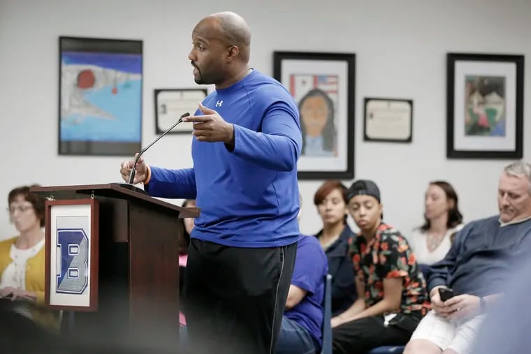 Rush Elementary School teacher Justin Ellis addresses the board during the Bensalem Township School District School Board Action Meeting on June 27, 2018.