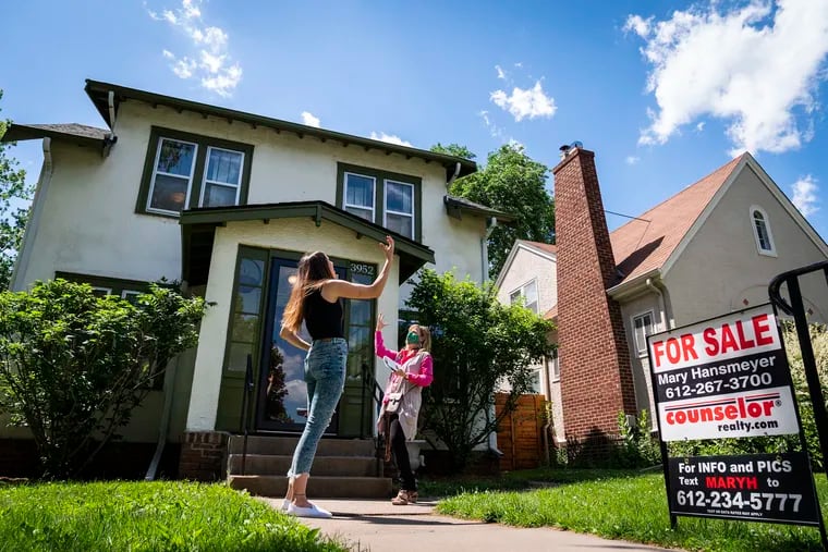 Kristin Hodnefield (left) jokingly expresses her frustration with the home buying process with her real estate agent Emily Green. Some agents are frustrated, too. The average brokerage fee in the United States fell to an all-time low in 2020, remaining below 5%.