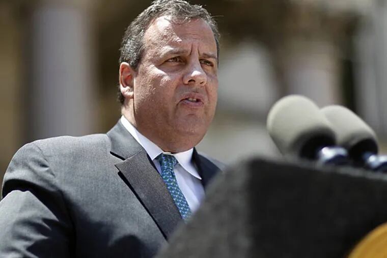 FILE - In this Tuesday, June 24, 2014, file photo, New Jersey Gov. Chris Christie addresses a gathering after he signed into law a bill that would extend the cap on arbitration awards to New Jersey's police and firefighters in Trenton. Christie's administration is facing an investigation into how it paid for a $1 billion repair of a New Jersey bridge. Two people said the investigation deals with whether funding for Pulaski Skyway repairs was misrepresented in bond documents by the Port Authority of New York and New Jersey. (AP Photo/Mel Evans, File)