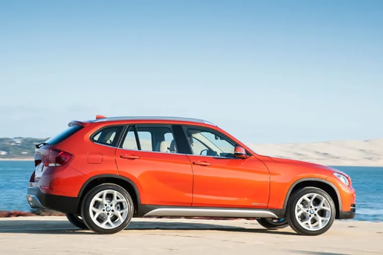 The 2013 BMW X1 is almost 5 inches lower and 6.5 inches shorter than its nearest sibling, the 2013 BMW X3. (BMW/MCT)