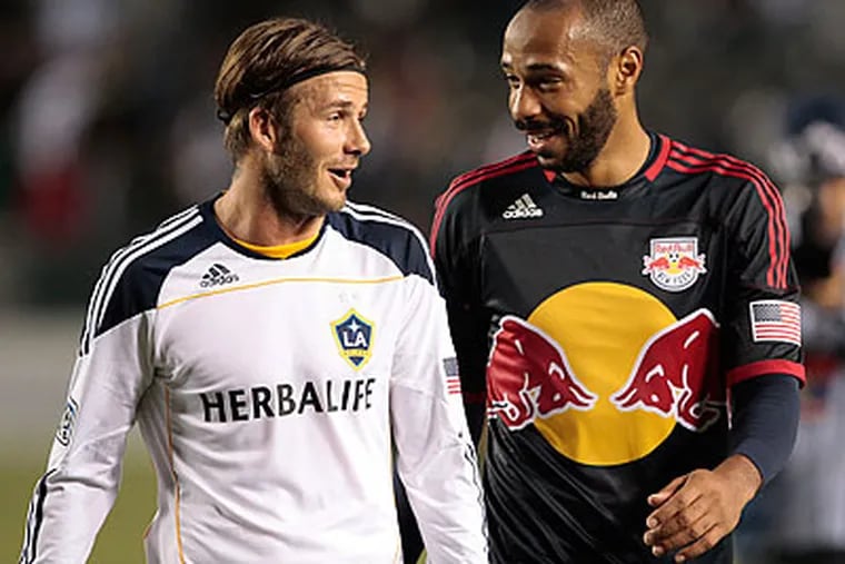David Beckham (left) won't be at PPL Park tonight when the Los Angeles Galaxy faces the Union. (Jason Redmond/AP)