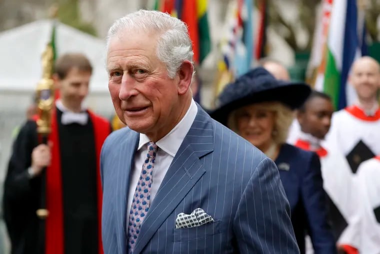 Britain's Prince Charles and Camilla the Duchess of Cornwall, in the background, leave after attending the annual Commonwealth Day service at Westminster Abbey in London, Monday, March 9, 2020. Prince Charles, the heir to the British throne, has tested positive for the new coronavirus. The prince’s Clarence House office reported on Wednesday, March 25, 2020 that the 71-year-old is showing mild symptoms of COVID-19 and is self-isolating at a royal estate in Scotland. For most people, the coronavirus causes mild or moderate symptoms, such as fever and cough that clear up in two to three weeks