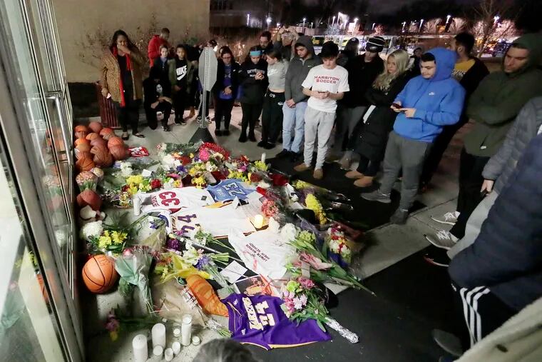 Fans at a makeshift memorial to Kobe Bryant at the Bryant Gymnasium at Lower Merion High School in Ardmore, Pa. on Jan. 26, 2020.