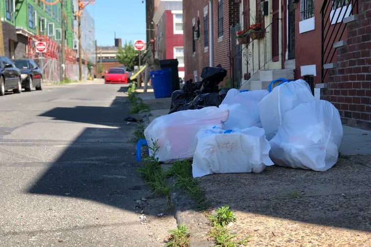 Trash piles up on the 1900 block of E. Boston Street in Fishtown.