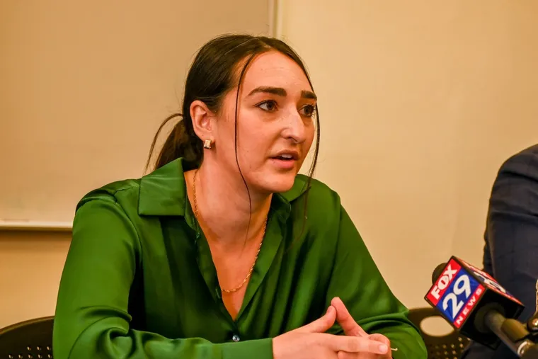 Natalie Abulhawa, a former athletic trainer for the Agnes Irwin School, speaks during a news conference Wednesday about her complaint alleging the school wrongfully terminated her.