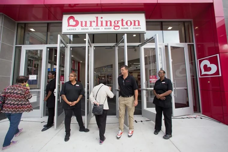 Shoppers and sales associates at the main entrance of the new Burlington Store at 833 Market Street.