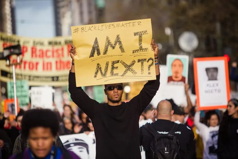 Protesters march through downtown San Francisco in December 2014 voicing their anger over grand jury decisions involving the deaths of Michael Brown in Ferguson, Mo., and Eric Garner in New York City.