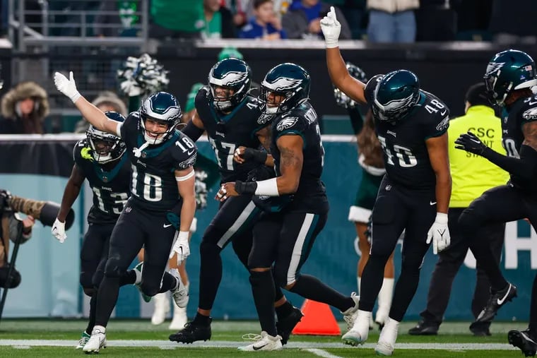 Eagles wide receiver Britain Covey (18) celebrates his 54-yard punt return in the first quarter against the Giants. Covey later recorded his first NFL catch in the Eagles' victory.