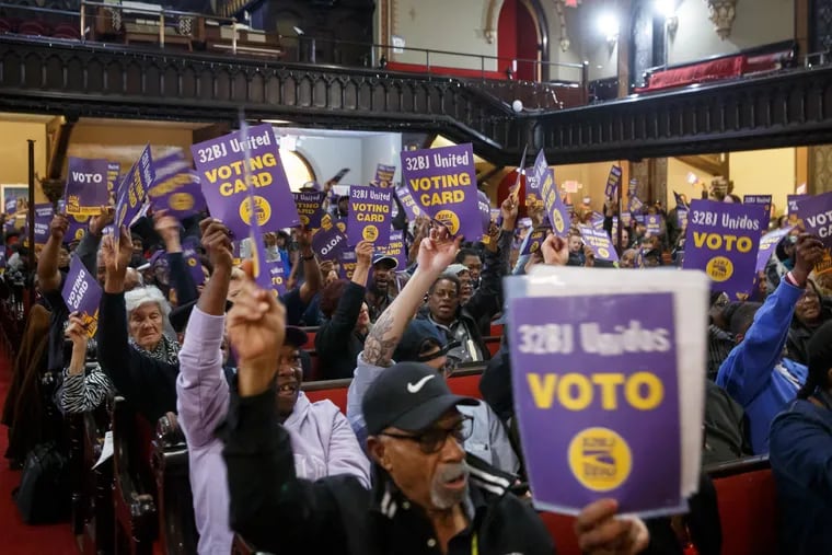 Cleaners at Center City and University City's commercial buildings vote to authorize a strike on Wednesday, Oct. 9, 2019, at Arch Street United Methodist Church near Philadelphia City Hall.