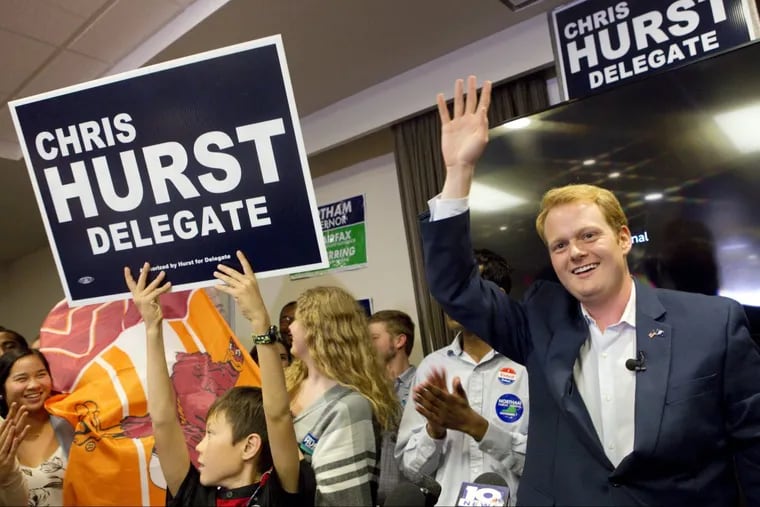 Democrat Chris Hurst, who defeated Republican Joseph Yost to win a seat in Virginia’s House of Delegates, celebrates with a packed room of supporters at The Hyatt Place in Blacksburg.