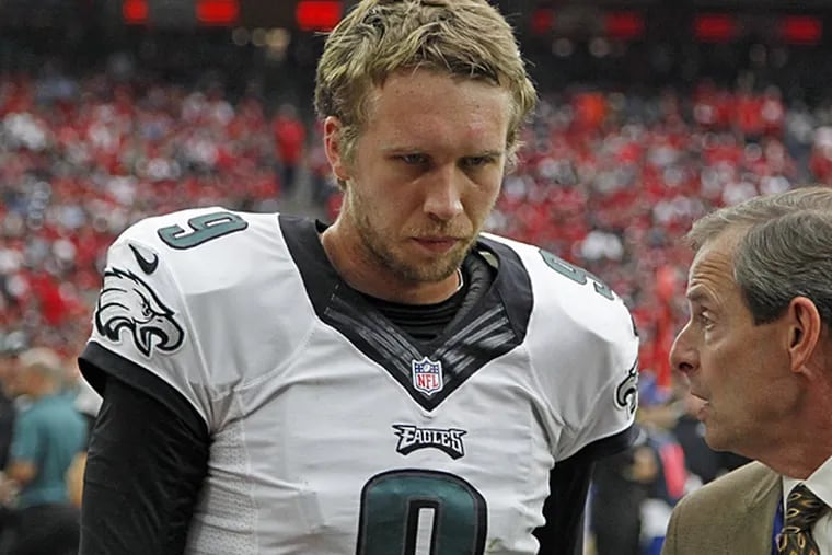 Eagles quarterback Nick Foles injured his shoulder against the Texans and did not return to the game. (Ron Cortes/Staff Photographer)