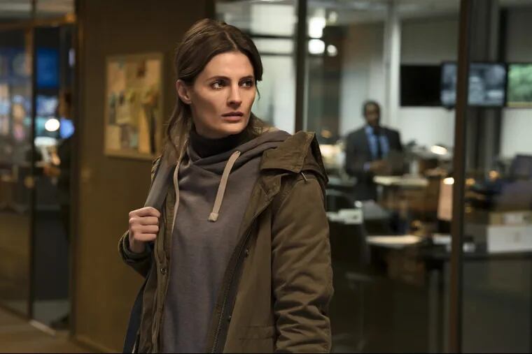 Former &quot;Castle&quot; star Stana Katic as Emily Byrne, an FBI agent long presumed dead, in a scene from Amazon's &quot;Absentia&quot;