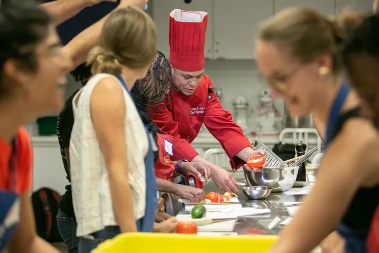 Chef José Luis Reynoso teaches a cooking class at The Free Library of Philadelphia last week.