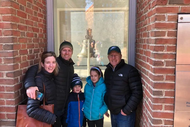 John Meehan (right) of Newtown, Pa., with his family (from left): Daughter-in-law Alison, son John, grandson Johnny, and granddaughter Lily.