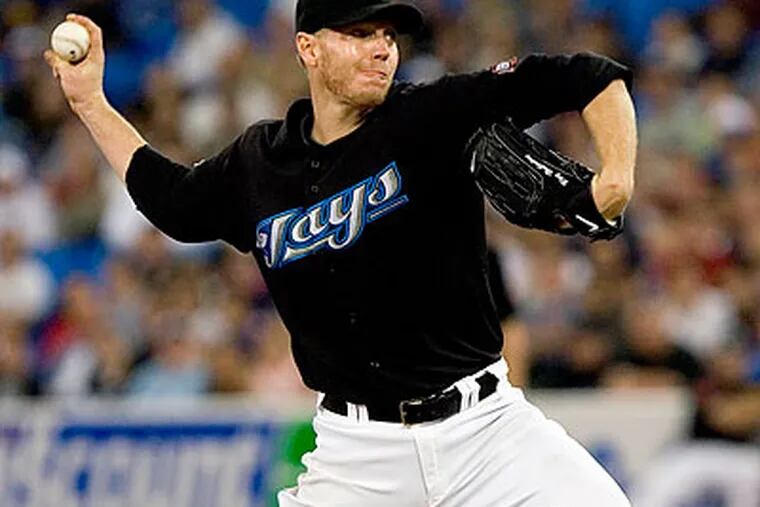 Multiple sources said that Halladay and his agent were in Philadelphia on Monday. (Darren Calabrese/Canadian Press/AP file photo)