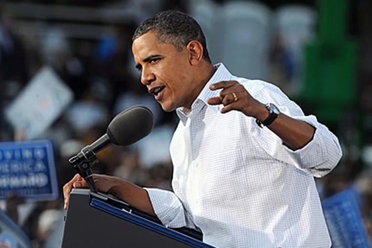 President Obama speaks during Sunday's rally in Germantown. (Sarah J. Glover / Staff Photographer)