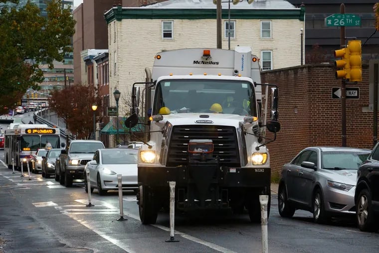 Trash truck driver Allen Williams drives a trash truck on South Street, in Philadelphia, November 12, 2019. Williams has had the most accidents (19) out of all drivers.