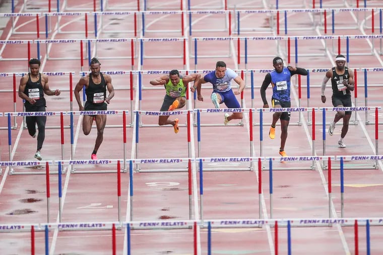 Hurdlers competing in the Olympic development 110-meter race at the Penn Relays on April 29, 2023.