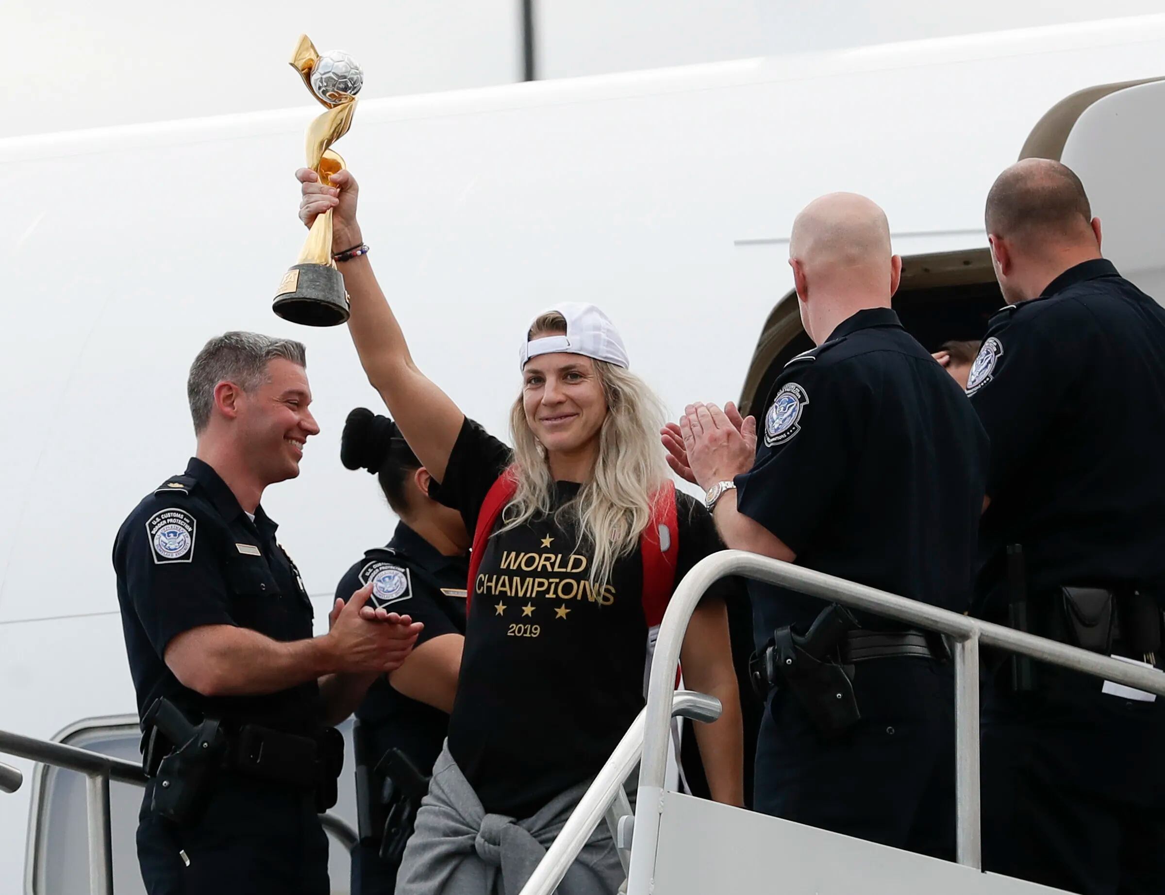 Julie Ertz brought the World Cup trophy off the plane when the U.S. women returned from France in 2019.