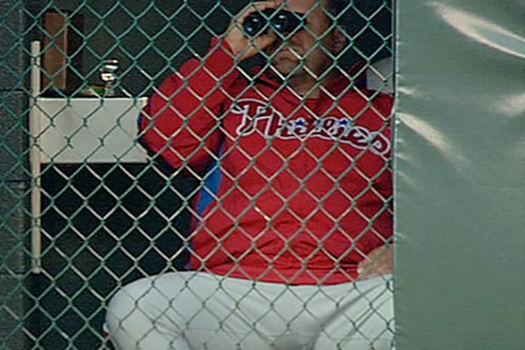 Mick Billmeyer was caught by television cameras using binoculars during Monday's game. (FSN Rocky Mountain/AP)