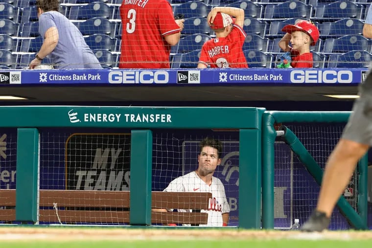 Phillies Andrew Knapp stared at the outfield and was the last to leave the dugout after the Miami Marlins at Philadelphia Phillies MLB baseball game at Citizens Bank Park in Phila., Pa. on May 19, 2021. Knapp almost tied the game with a shot to deep right center field in the bottom of the ninth inning.