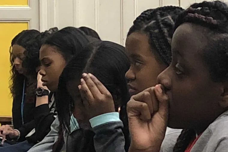 Students at Parkway Center City Middle College listen to classmates talk about the national attention on mass shootings as the daily gun violence they live with goes unnoticed.