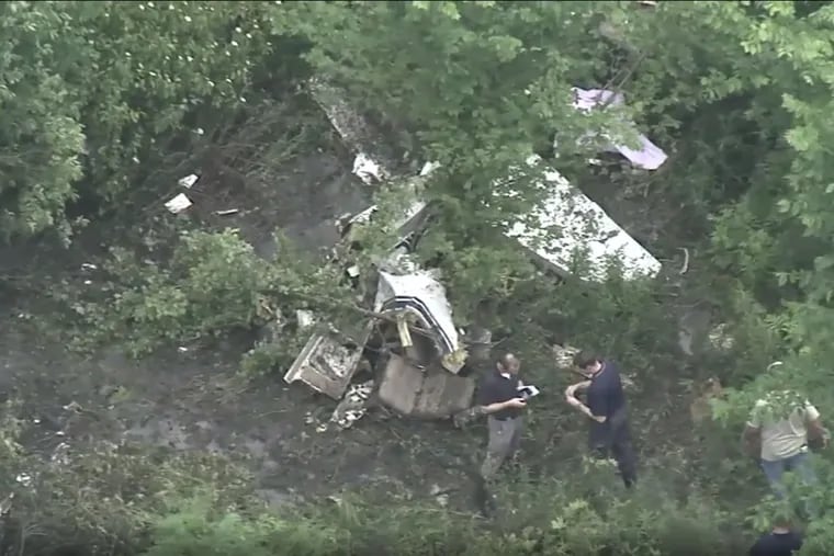 Two men were killed Wednesday when a small passenger plane crashed in a rural part of Springfield Township, Burlington County. The twin-engine, six-seat Beech Baron 58 plane came down about 9:15 a.m along Smithville-Jacksonville Road plowing through a field and across the roadway before tearing into a stand of trees and bursting into flames, officials and witnesses said.