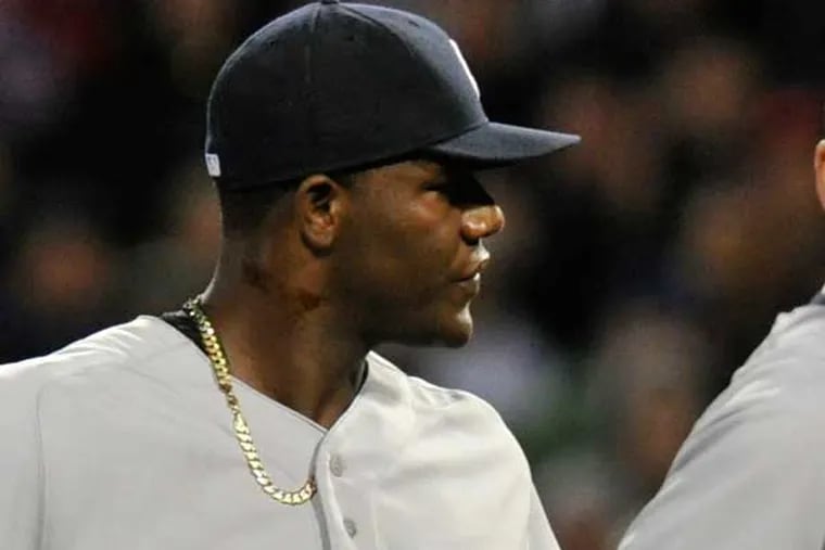 Apr 23, 2014; Boston, MA, USA; New York Yankees starting pitcher Michael Pineda (35) is ejected from the game for having a foreign substance on his neck during the second inning against the Boston Red Sox at Fenway Park. Mandatory Credit: Bob DeChiara-USA TODAY Sports
