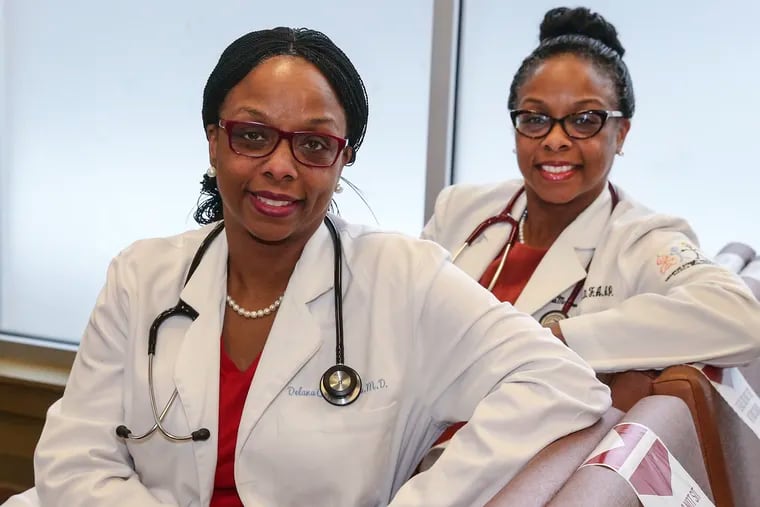 Dr. Delana Wardlaw (left) and Dr. Elana McDonald, both 46, are identical twin doctors who grew up in North Philly. Both graduated together from Central High School, Temple University, and Penn State Medical School school and have separate medical practices in Philly dedicated to serving underserved people and encouraging them to be empowered health consumers. They were involved in the Black Doctors COVID-19 Consortium early on, and have their own organization, too. Friday, February 19, 2021.