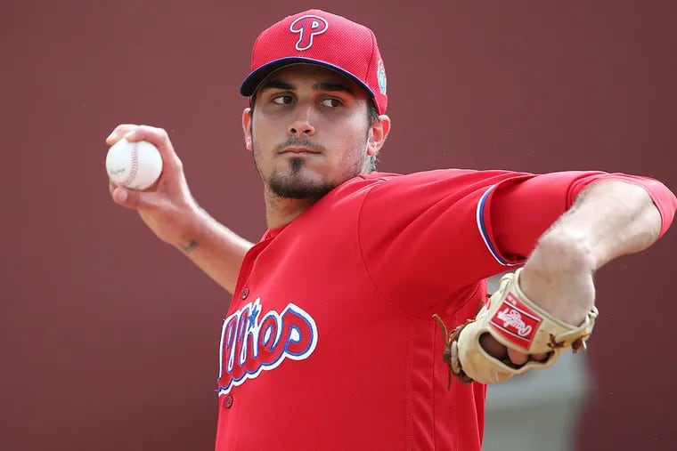 The Phillies' Zach Eflin throws a bullpen session at spring training on Feb. 24, 2016.