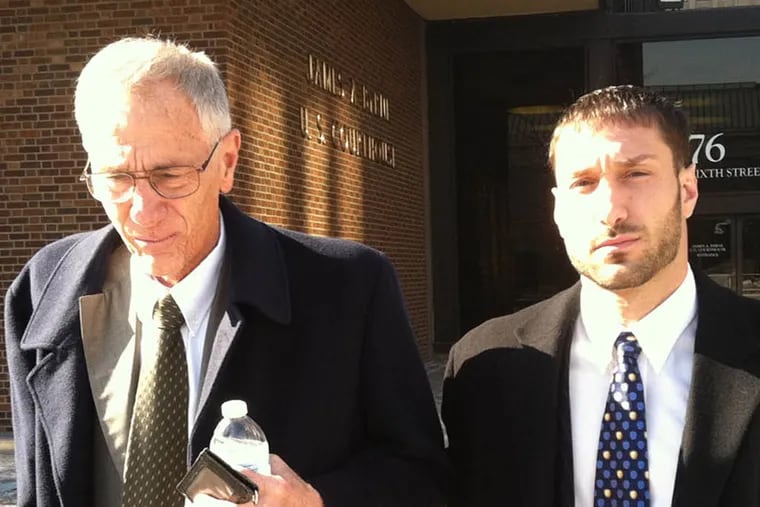 Joseph Mastronardo Jr. and his son, Joseph, leave court on Jan. 31, 2014.