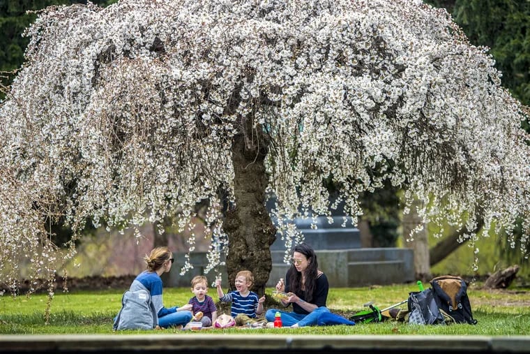 A family enjoys a fine day at the Horticultural Center in Fairmount Park. Characteristics like recreation and diversity did not figure into Zumper's assessment of good places to raise families.