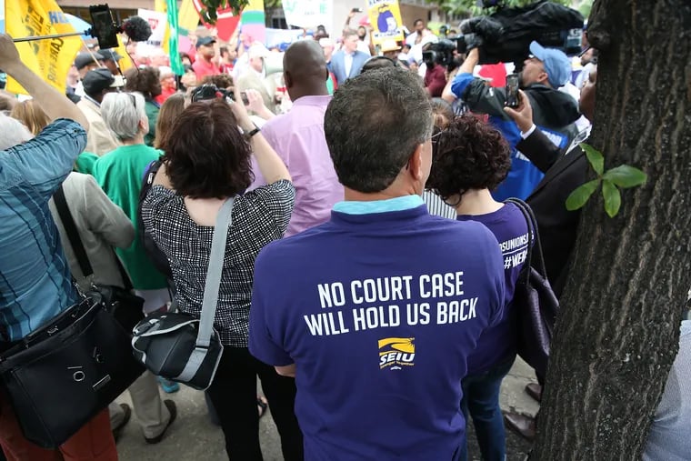 Philadelphia unions rally outside Federal Court in Philadelphia, PA on June 27, 2018. The U.S. Supreme Court ruled Wednesday on Janus vs. AFSCME, a challenge to the rights of public unions to collect money from people who don't want to be members. This landmark decision could weaken both unions and a financial pillar of the national and state Democratic parties, upending politics. DAVID MAIALETTI / Staff Photographer