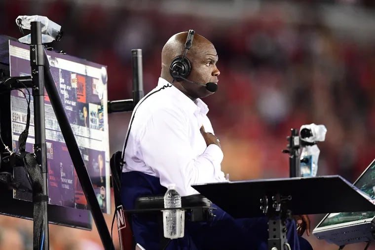 ESPN's Booger McFarland calls the network's "Monday Night Football" games from an elevated chair on wheels that has become known as the "Booger Mobile."